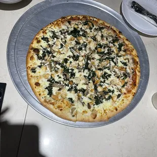 Spinach Feta Pizza with chicken. One side red sauce one side white