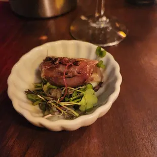 Amuse bouche before the tasting menu - fig/bacon/gorgonzola