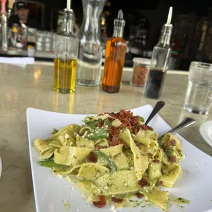 Pasta with Parmesan, potato, basil pesto, green beans, and bacon