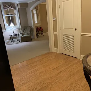 Entry room to suite.  Bistro table, mini fridge, microwave and large closet