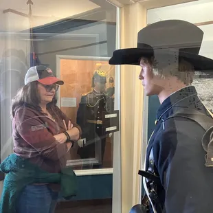 Many period military uniforms are on display in the museum.