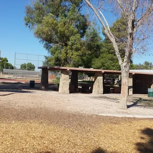 Bathrooms and ramada right next to the play area.