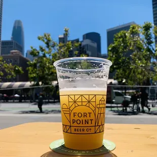 a glass of beer on a table