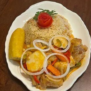 a plate of rice and vegetables