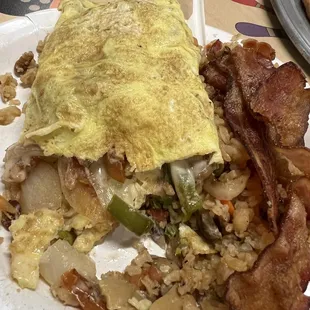 Veggie omelette (canned mushrooms, onions, cheese, bell peppers, tomatoes &amp; green onions). Fried rice. Side order bacon, 3 pcs