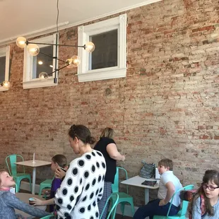 a group of people sitting around a table