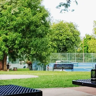 View of the tennis courts from the picnic shelter