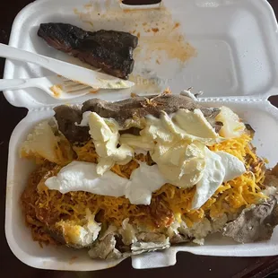 a meal in a styrofoam container