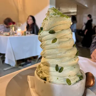 an ice cream cone on a plate