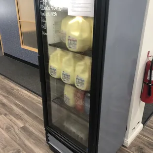 a refridgerator filled with milk