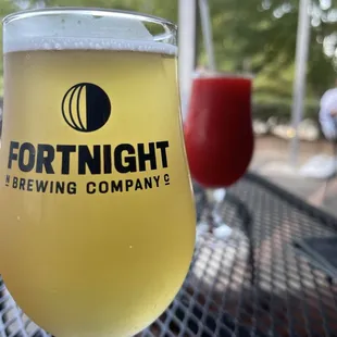 a glass of beer on a table