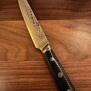 Awesome Damascus steel steak knife (wanted to take this home )