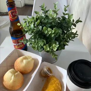 a cup of coffee and two pastries