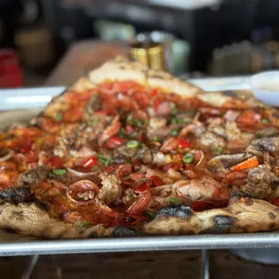 Regular size Meatzilla with white onions added.  Hot honey on the side.