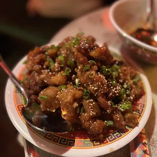 a plate of food with a spoon