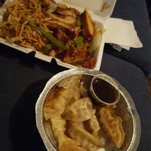 Bourbon chicken with lo mein, and yummy potsticker/gyoza.