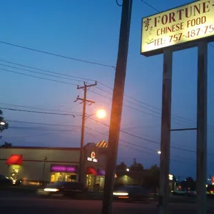 a view of a street at night