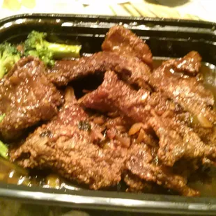 Dry orange beef jerky (with 3 tiny broccoli nibs)