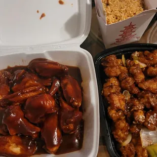 two takeout containers of food