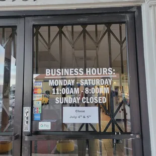 a closed business hours sign