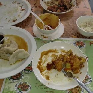 a table full of plates of food
