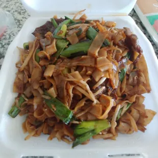 Beef Ho Fun noodles (no white onion). Delicious!