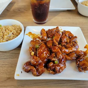 Crispy orange chicken and chicken fried rice.
