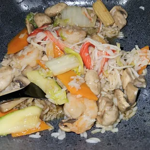 a plate of rice and vegetables