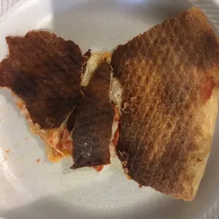 Why even serve a pizza like this. Pizza rips when you pick it up due to terrible slicing after cooking.