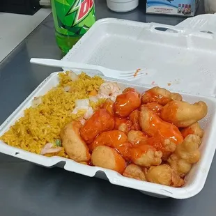 Sweet and sour chicken, veggie egg roll and mountain dew