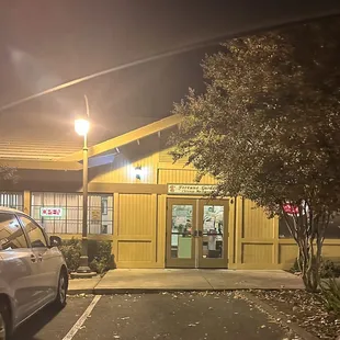 a car parked in front of the restaurant