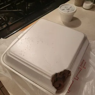 Food arrived with hole in box (not delivery person&apos;s fault - no chunk of Styrofoam in the bag)