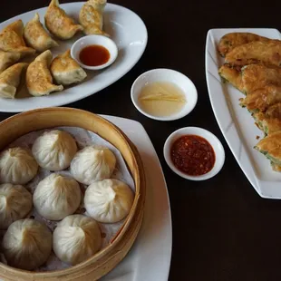 Xiao long bao, shrimp and pork fried dumplings, and scallion pancakes