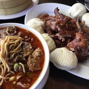 Hot and spicy beef noodle soup and deep fried marinated duck