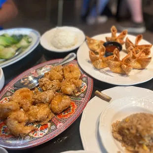 a table full of chinese food