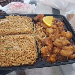 Orange Chicken and fried rice lunch special.  Tastes great but not spicy at all.