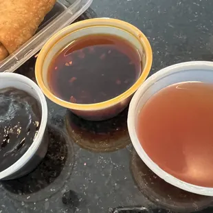 Left to right; Hoisin, chili oil and plum sauces