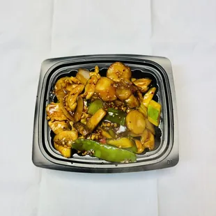 a plate of chicken and vegetables