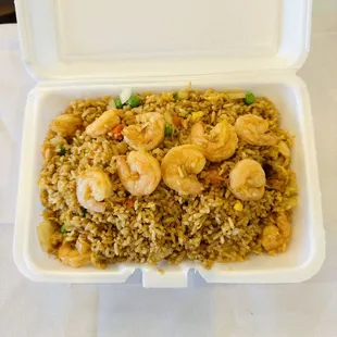 shrimp fried rice in a styrofoam container