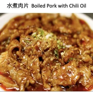 a plate of food with meat and sauce