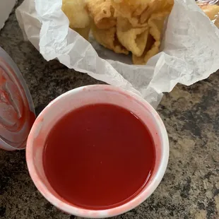 Decent crab rangoons w/ cherry kool aide flavor/consistency &quot;sweet &amp; sour sauce&quot;.