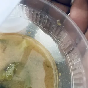 Container full of veggies, chicken, beef, shrimp and worms