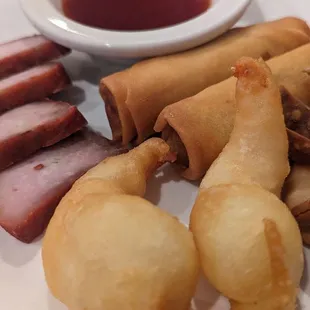 Egg Roll; Sliced BBQ Pork; Crab Rangoon and Deep Fried Prawns