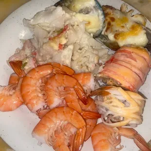 a plate of seafood and rice