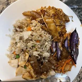 a plate of rice and vegetables