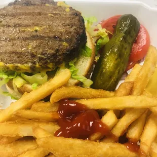 a hamburger and fries with ketchup