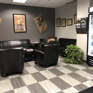 seating area with chairs and a beverage cooler