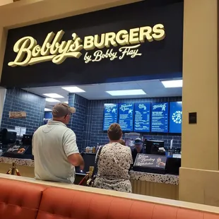 Bobby&apos;s Burger by Bobby Flay. Spent $62 for 2 onion rings, 2 drinks and 2 burgers (bbq smokehouse and crunch burger). I expected flavor.