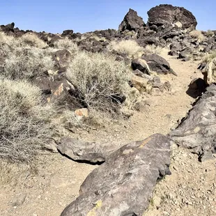 The large rock in the background has the last yellow marking before the falls on the right after you pass the rock