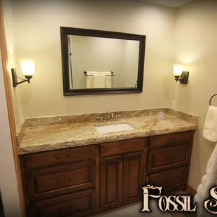 a sink and mirror in a bathroom